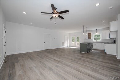 A view of the spacious living room with LVP floors