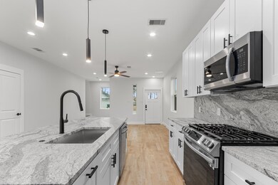 ** PHOTO IS OF ANOTHER SIMILAR FLOORPLAN DUPLEX.