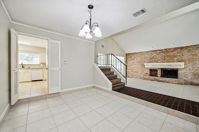 Formal entry leads to oversized formal living on the right and formal dining room on the left.
