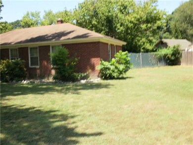View of the east side of the home..Fenced backyard