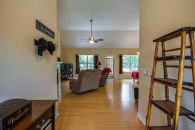 GORGEOUS ENTRY WAY LEADS TO INVITING OPEN FLOOR PLAN THROUGH OUT LIVING, KITCHEN AND DINING AREA