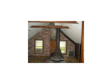 Other. Attic hideaway with fireplace