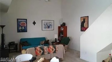 Living room featuring carpet flooring
