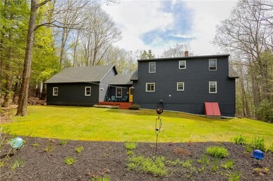 Rear of home. With 3.29 acres, there...