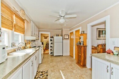 View of kitchen with living room...