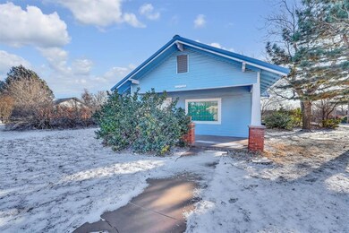 View of snow covered property. Big Picture Window 