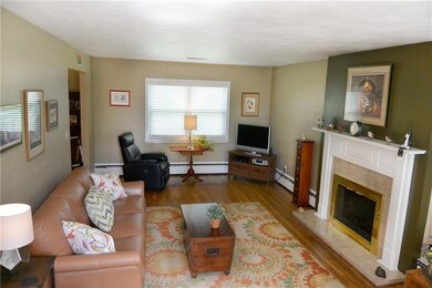 Another view of the inviting Living Room with glea
