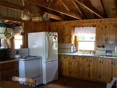 Rustic pine adds to the charm of...