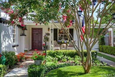 Charming entry and brick accented porch, driveway 