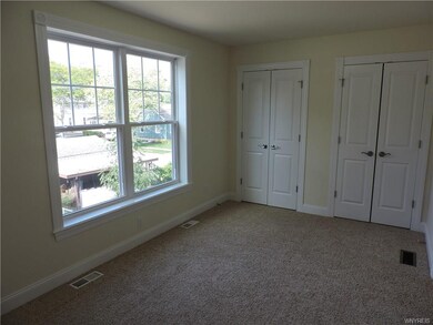 Bedroom 1 with double closets.