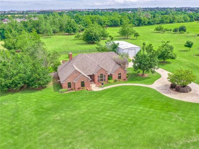 Circle drive, wooded lot, workshop, in-ground spri