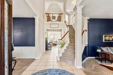 Step inside to a light-filled foyer that radiates warmth and effortlessly draws you into the heart of the home.
