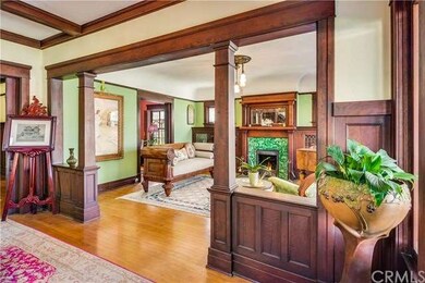 Foyer showcasing beautiful woodwork as you enter the Living Room.
