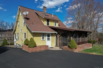 Rear of home with large porch