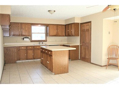 Kitchen with large eat-in area.  Additional seatin