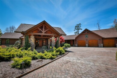 Three car garage boasts amazing storage, granite c