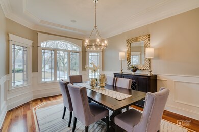 Updated lighting, crisp white wainscoting, fresh i