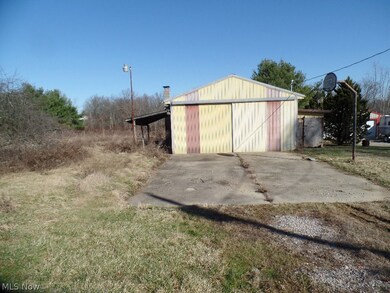 Detached garage and basketball court