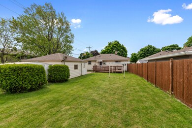 Large backyard facing home.