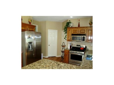 Another view of kitchen ..door to the left is half
