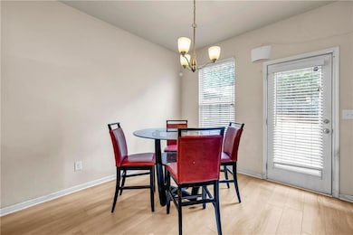 Dining room featuring light wood-style flooring, a