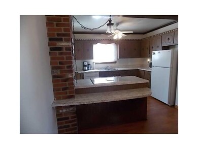 Kitchen. Cute breakfast bar!