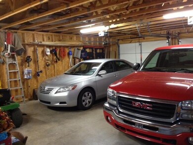Inside View of Detached Garage, Enough Parking for the Whole Family ….. There is another 2 Car Garage Attached to the Home 