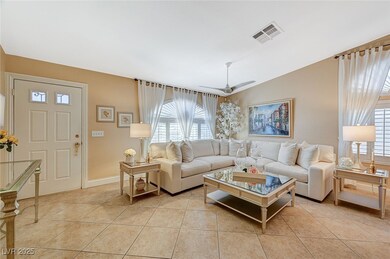 Tiled living room with vaulted ceiling and ceiling