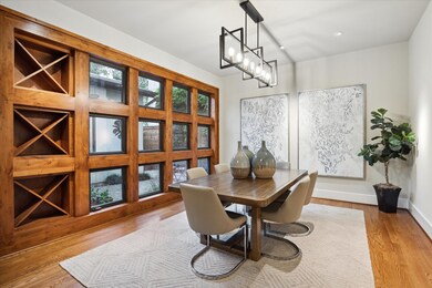 DINING ROOM - Formal dining room features a dramat