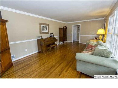 Formal Living Room With Beautiful Hardwood Floors