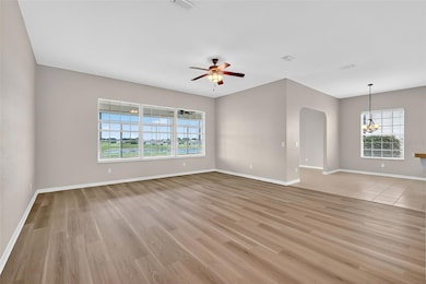 Living Room with Golf and Water Views