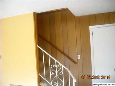 stairway leading up to the bed rooms