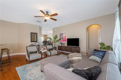 Family Room. The archway leads to a private downst