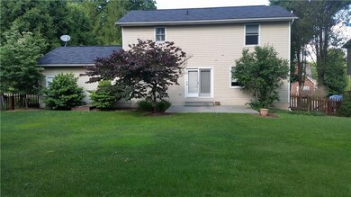 Beautiful Backyard with Concrete Patio!