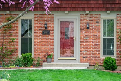 Brick fascia and mature landscaping