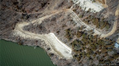 Dock permit, deck and stairs to lake.