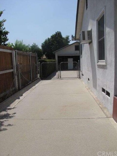 Long Driveway to rear detached garage