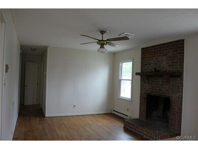Family room or Den with wood burning fireplace and