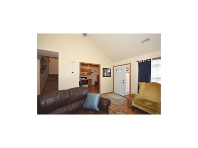Front door and entry to kitchen