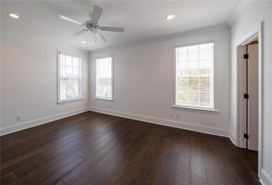 Bright and airy Master Bedroom has plenty of light
