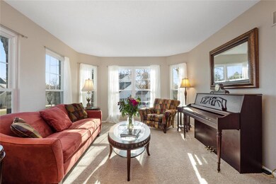 The Formal Living Room is light and bright with fi