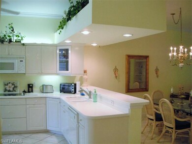 Updated Kitchen With High Gloss Cabinets & Corian 