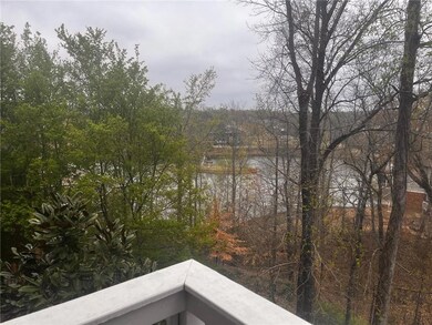 Water view featuring a heavily wooded area