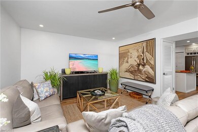 Living room featuring light hardwood / wood-style 