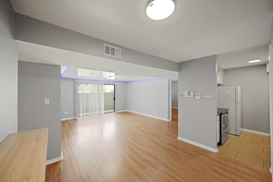 The dining area is ideal for a full-sized table wi