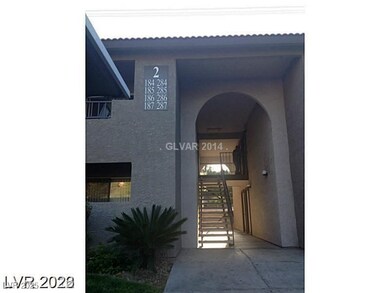 Entrance to property featuring stucco siding