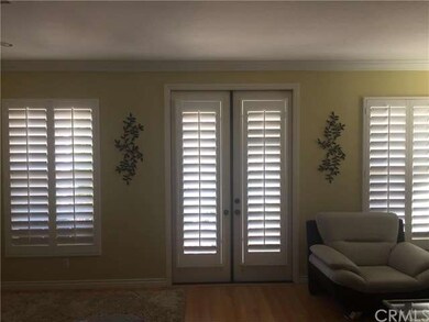 DOUBLE DOORS TO BALCONY FROM THE LIVING ROOM