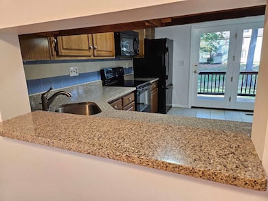 Pass-through from living room to kitchen