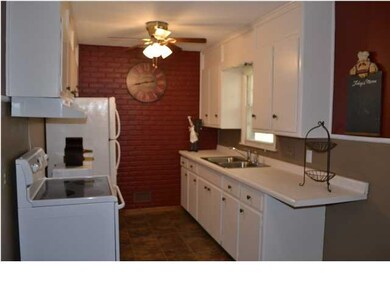 Kitchen features, range, vent hood, refrigerator, 