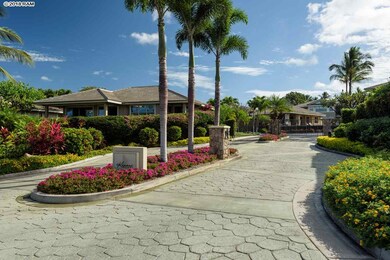 The gated and beautifully landscaped entrance to K